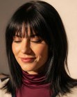 Cabello lacio a la altura de los hombros